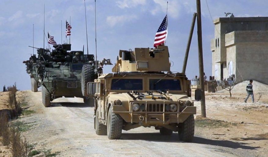 Tình hình Syria: Trực thăng Mỹ mang theo súng máy yểm trợ đoàn xe ở Syria