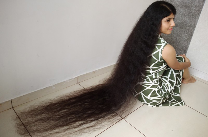 Té ngửa với mái tóc dài nhất thế giới đến gần1 km