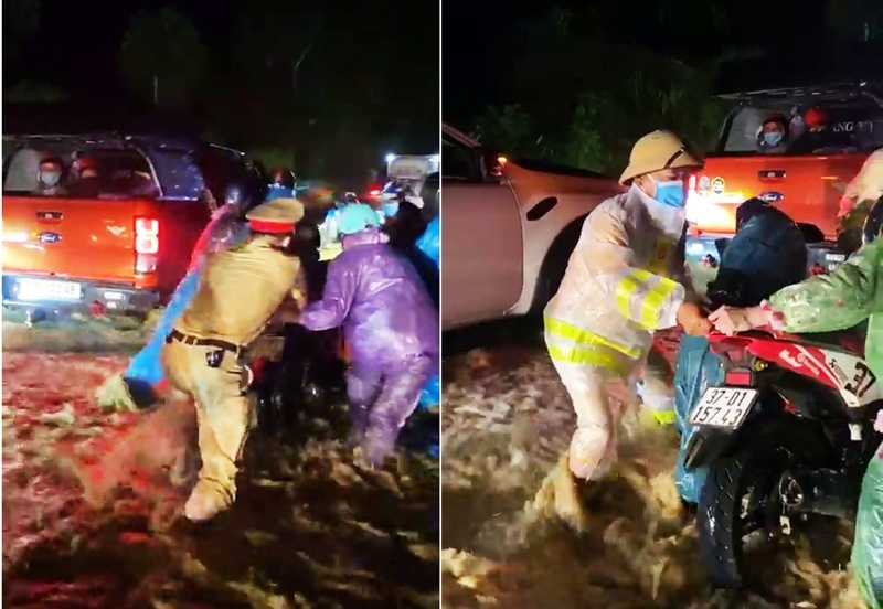 CSGT dầm mưa, lội nước lũ đẩy xe giúp đoàn người về quê qua đèo Lò Xo