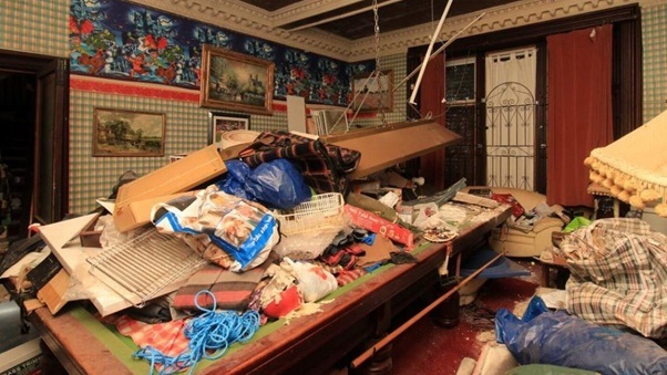 The house full of garbage is for sale at a “heavenly” price