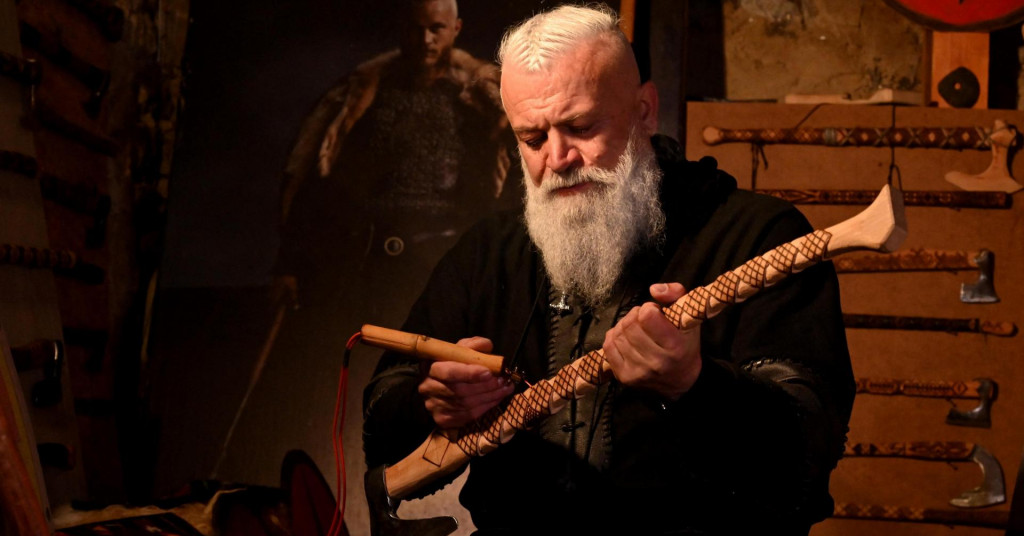 Passionate about Viking culture, the man carries the ax for a living