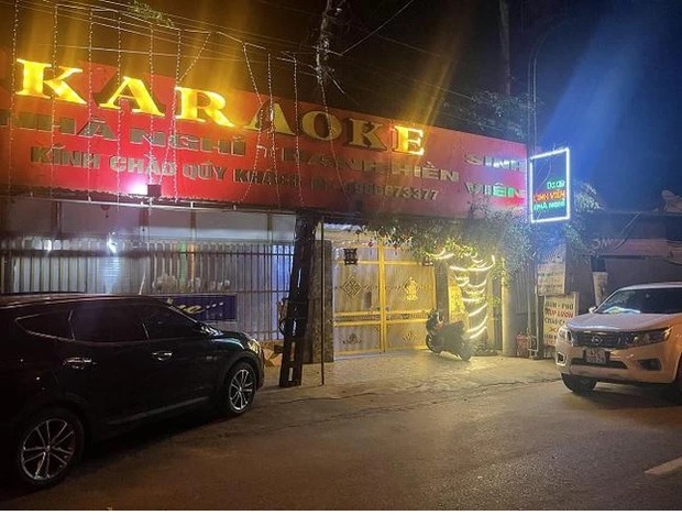 Police surround a place of prostitution and drugs hiding in the shadow of a karaoke bar