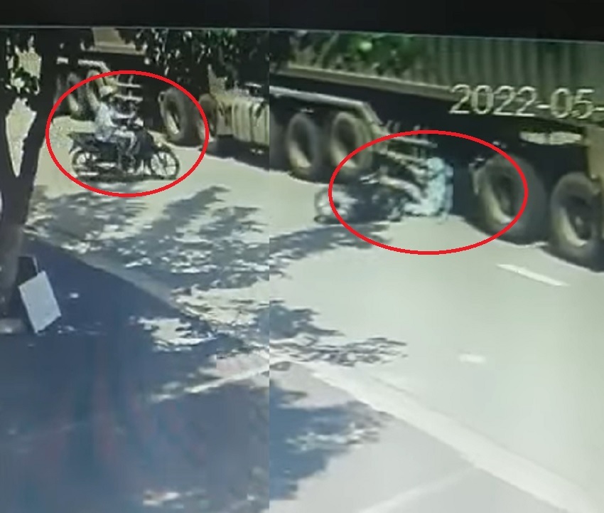 Clip of a girl miraculously escaping death under the wheel of a super-heavy truck