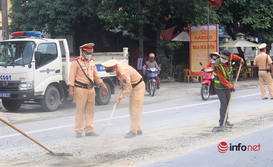 Cảnh sát giao thông,bê tông,vật liệu rơi vãi,quốc lộ 1A,Nghệ An,nguy hiểm,dọn đường