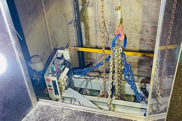 Two male elevator repair workers were rescued but still tragically died