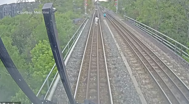 Lucky to escape death when playing near train tracks in Canada